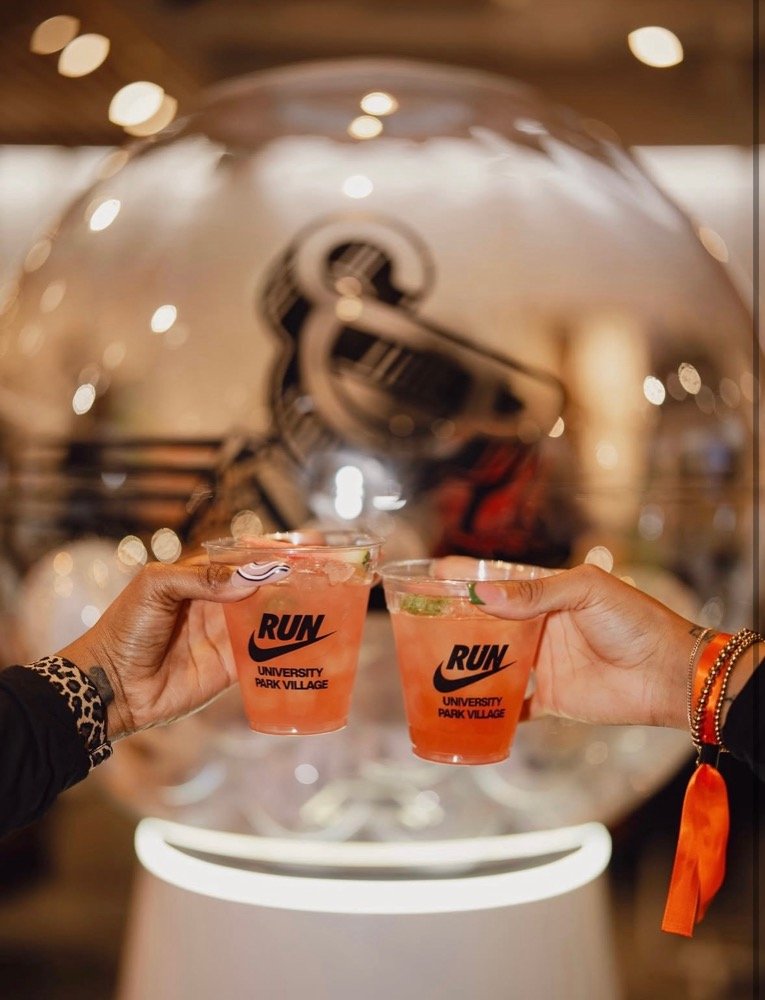 Guests toasting at a Nike event